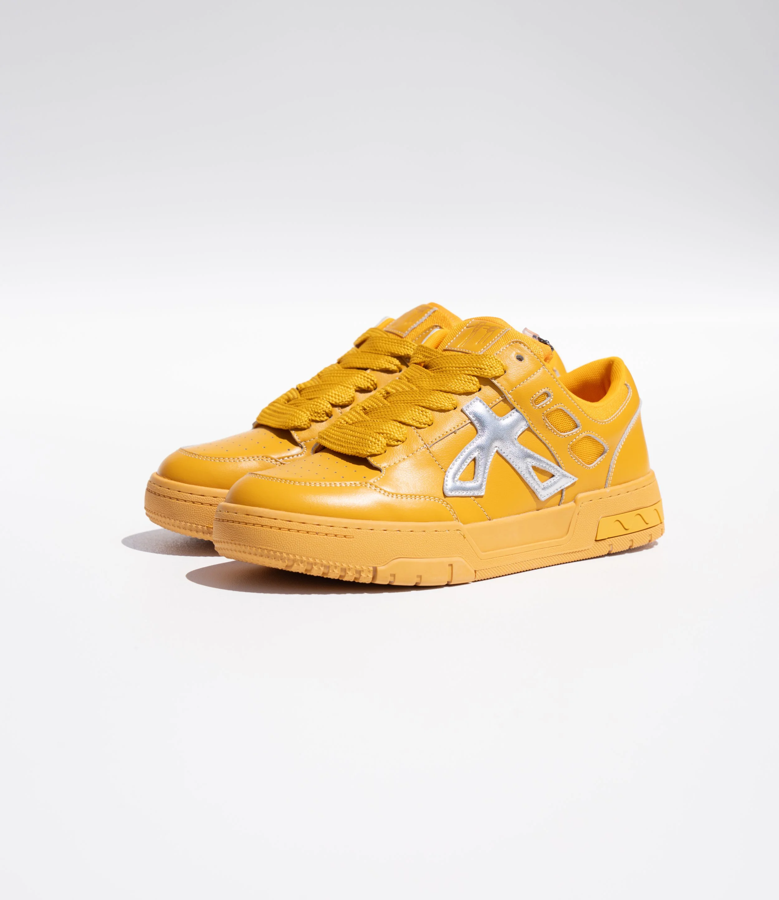 Eli "Hope Gold" shoe by Juan Wilson