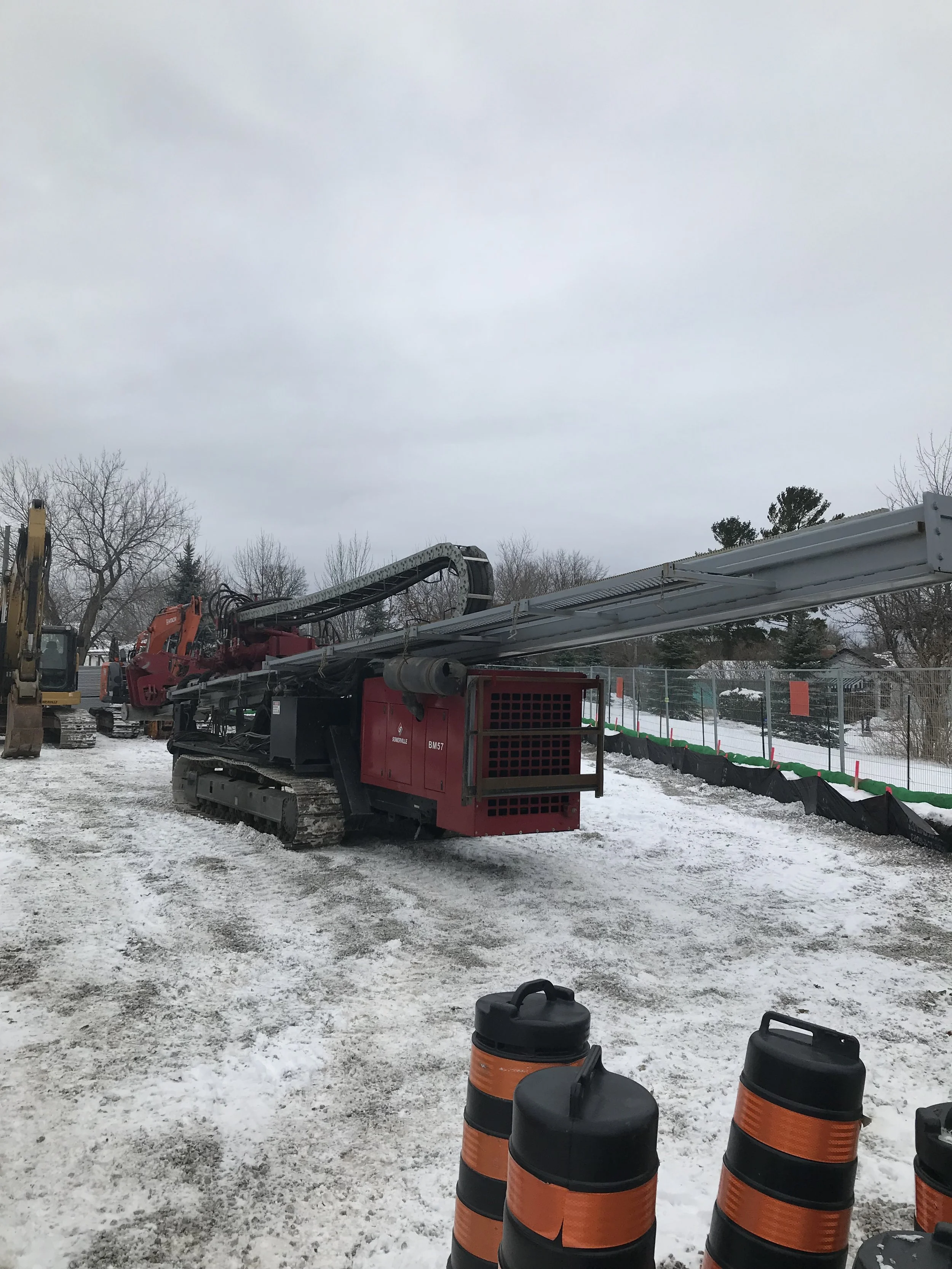 The Horizontal Directional Drill (HDD) being unloaded. The HDD was used to bore a hole that the new natural gas pipeline would be inserted through.