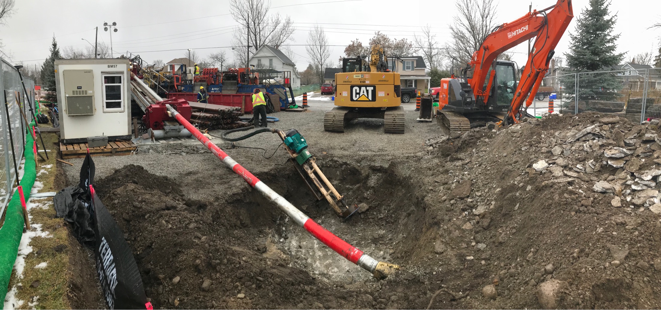 Crews prepare the powerful HDD to bore holes through layers of rock. The new natural gas pipeline was installed beneath the Fenelon River. 