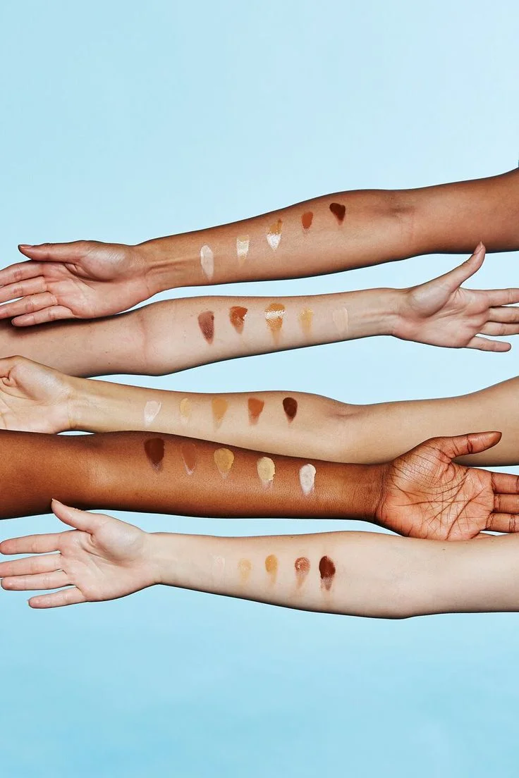 Glossier swatches of Perfecting Skin Tint represented in different shades.