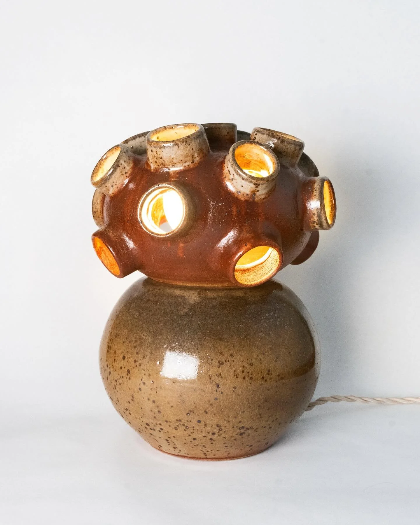 After getting lots of fun commentary&mdash;sea creature, scuba helmet, alien, planet, video game character (one I&rsquo;ve never heard of)&mdash;this weird little ceramic lamp baby found a new home last weekend! Hope it&rsquo;s casting cozy light and