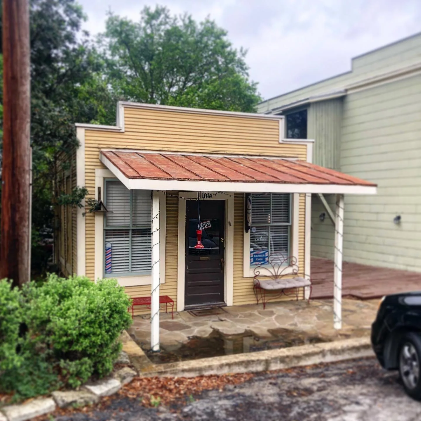 The epitome of #neighborhoodcommercial #barbershop