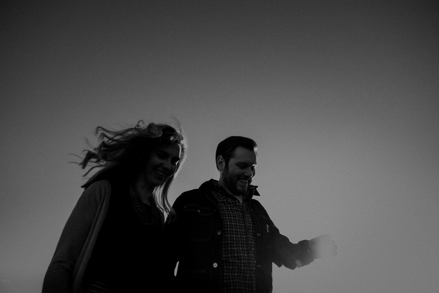 A couple take creative engagement photos before their wedding in the Blue Mountains