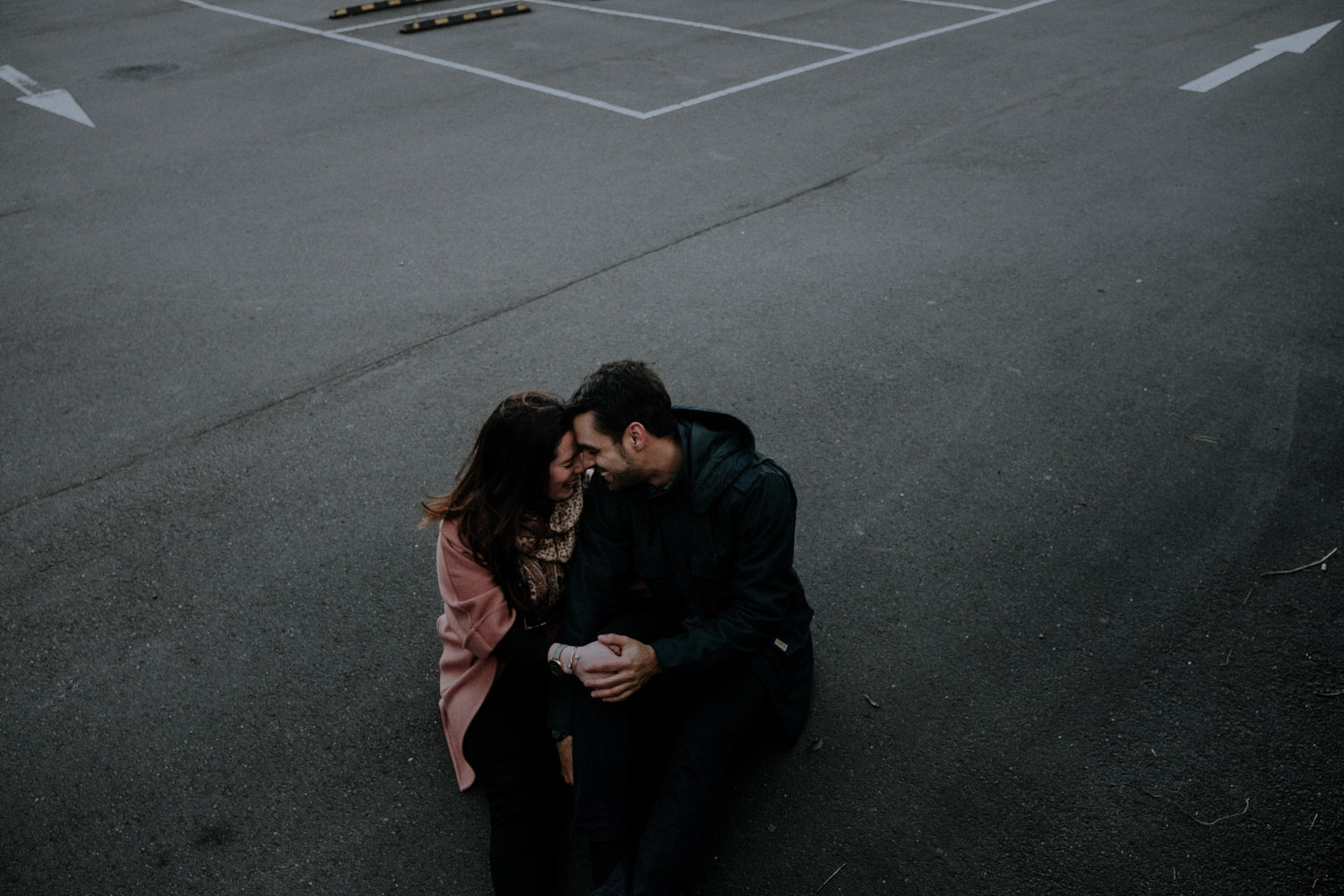 A couple take creative engagement photos before their wedding in the Blue Mountains