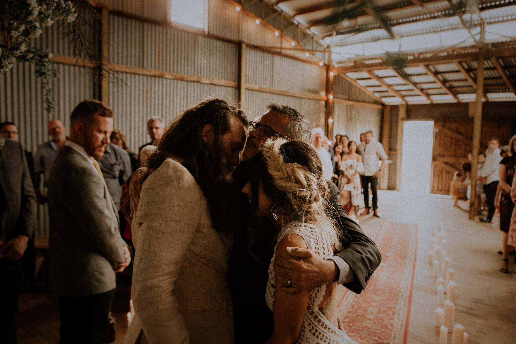 Boho chic wedding ceremony in a rustic shearing shed at Waldara Farm