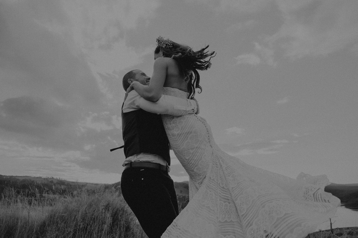 Bride and groom having sunset portraits for their wedding by Lake Lyell, Lithgow