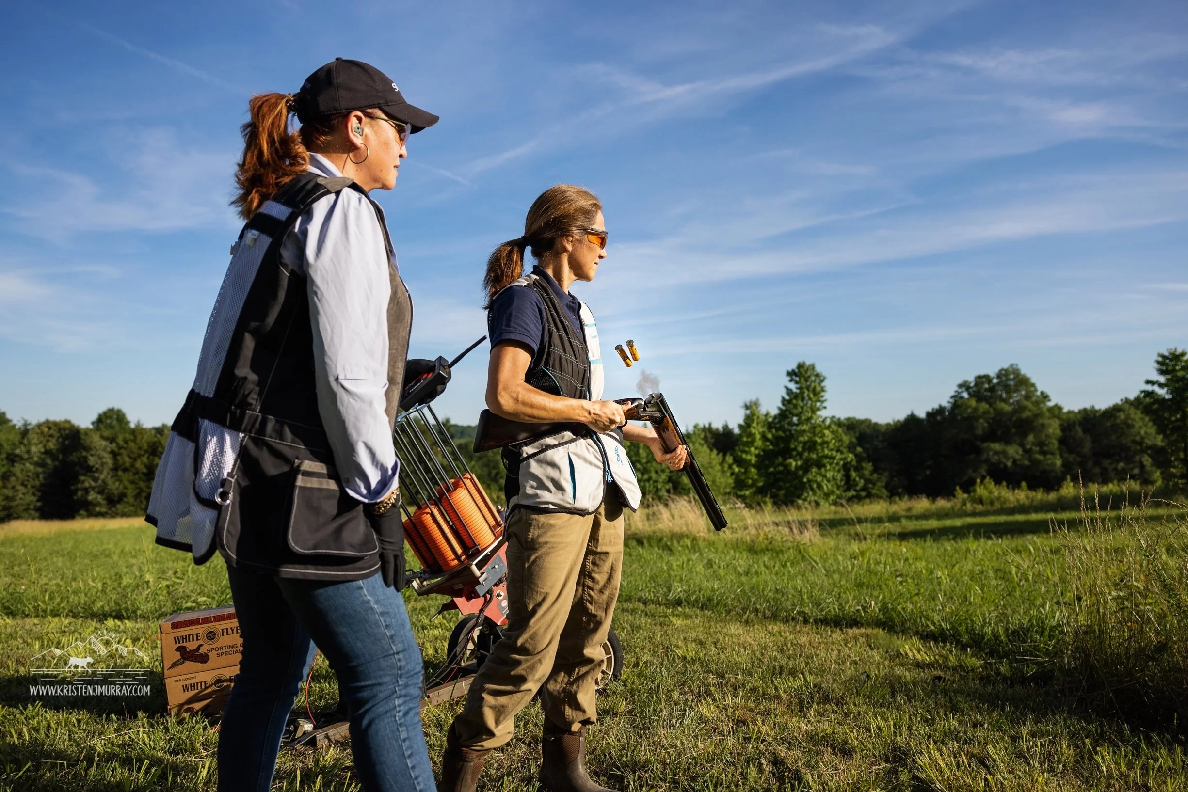 Kate is instructing wingshooting. Virginia Shooting Sports