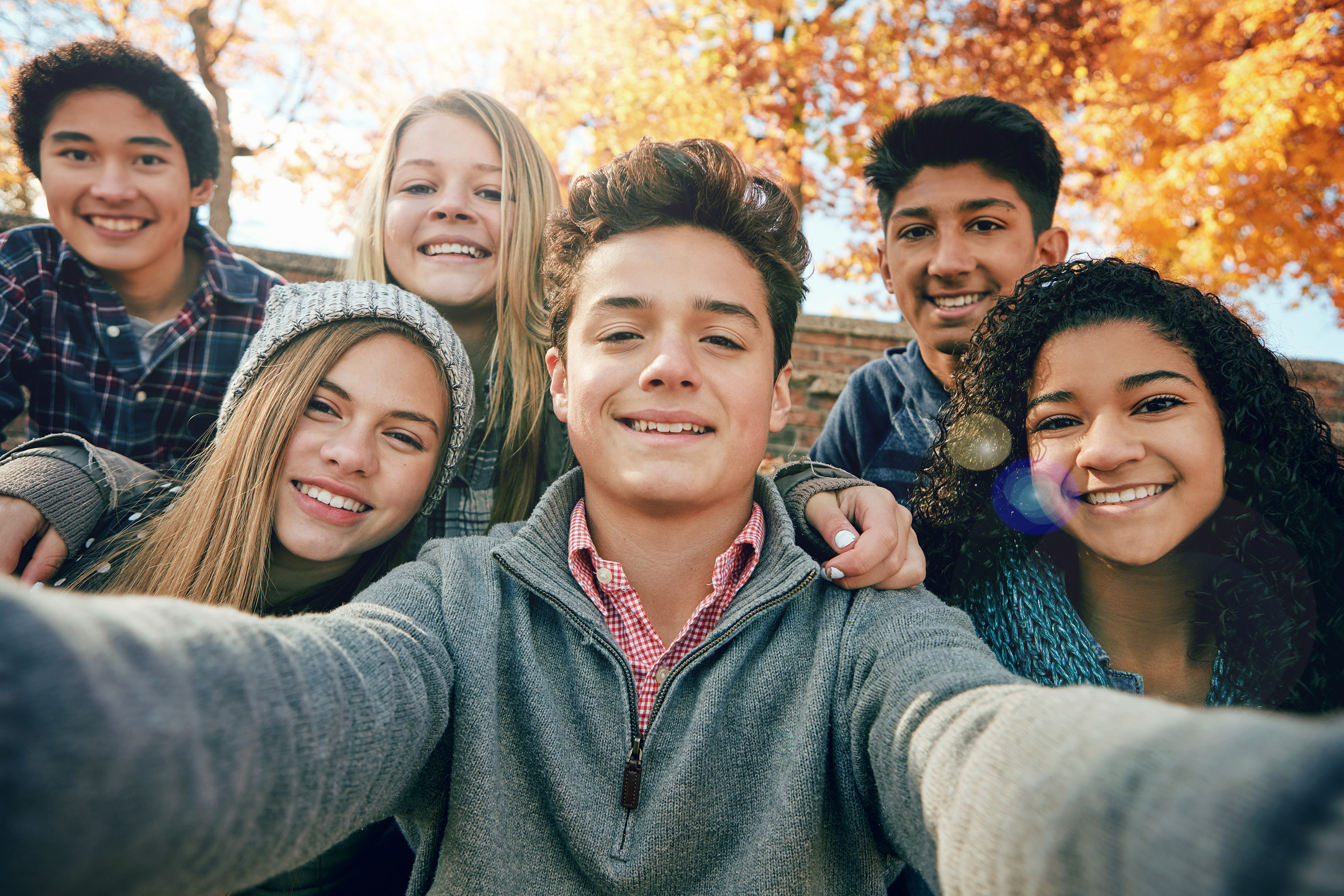 iStock-644990988_TeenGroupSelfie-25%.png