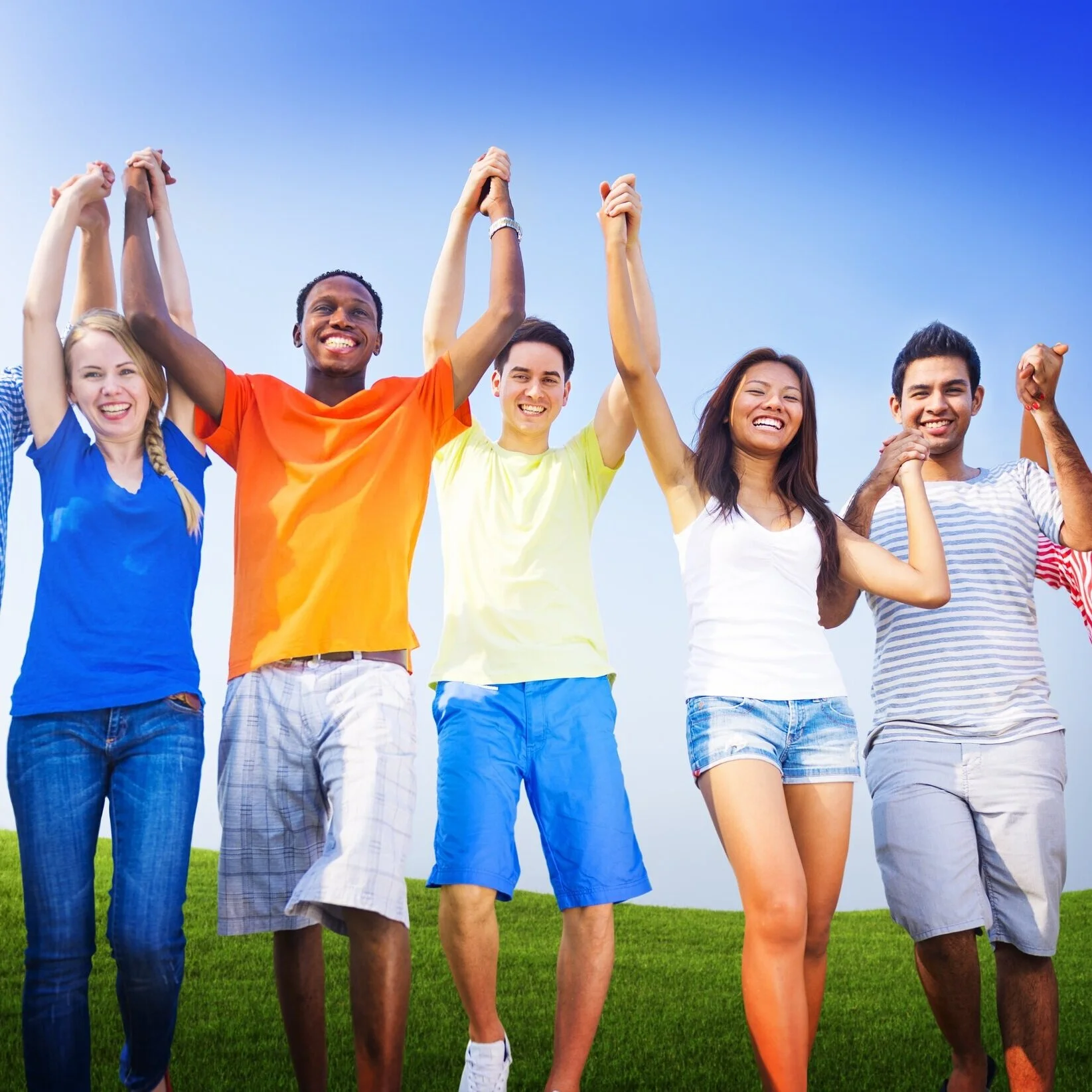 TeensCelebratingArmsRaised-Paid.jpg