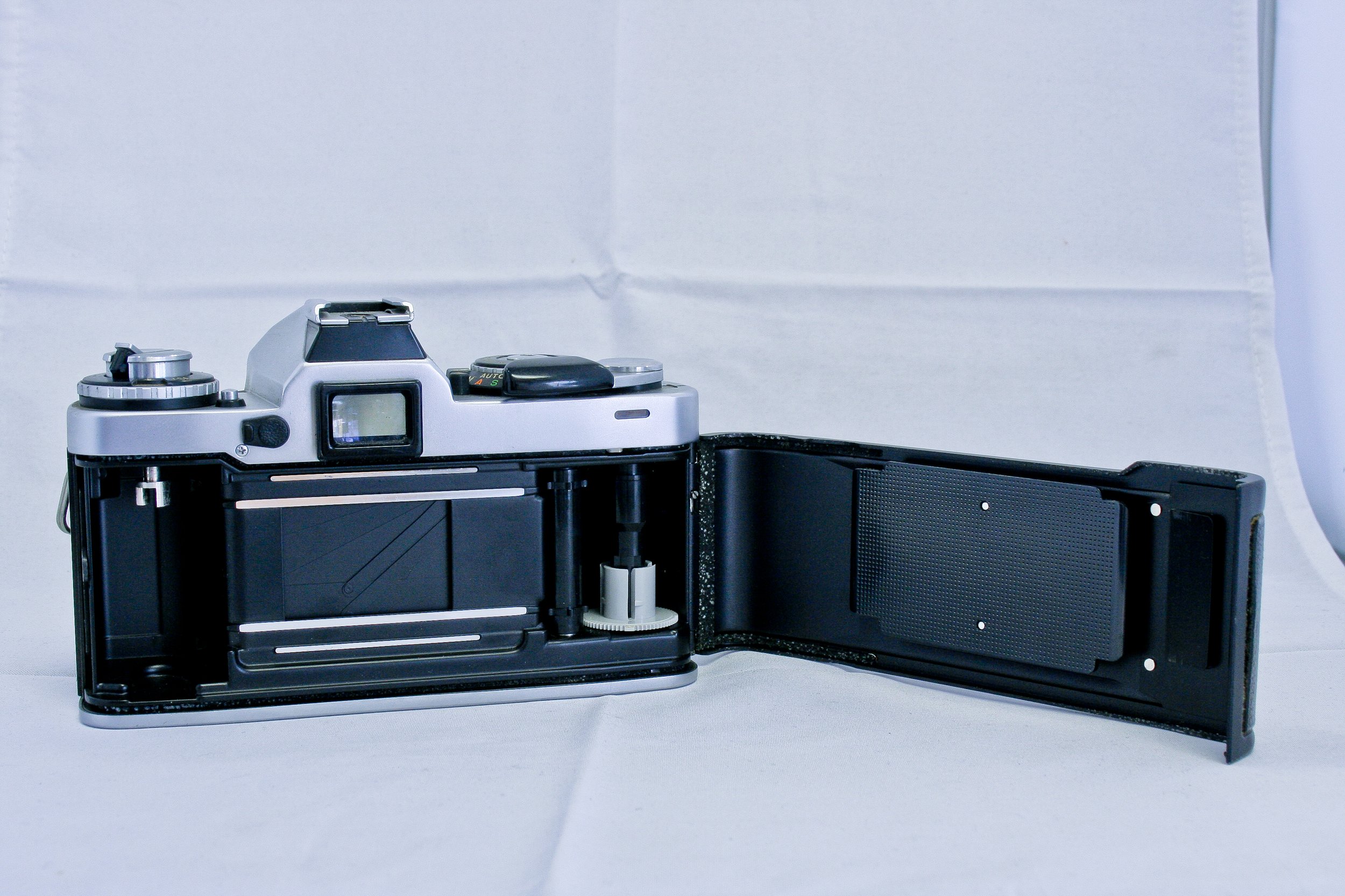Minolta XD 11 w/ 50mm Rokkor X lens (*) — Camera Center