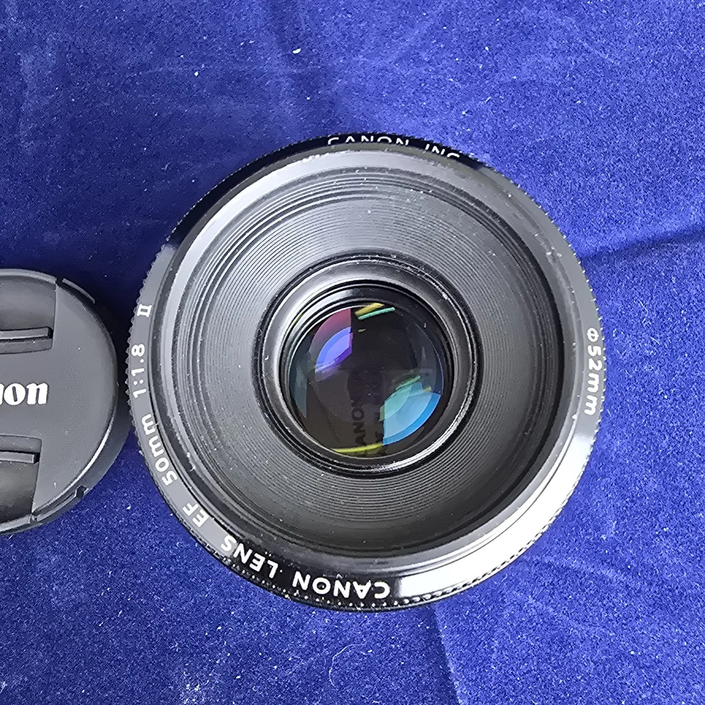 みさき　Canon 50mm Canon Lens FD 50mm 1:1.8 lens cover and 52mm skylight filter