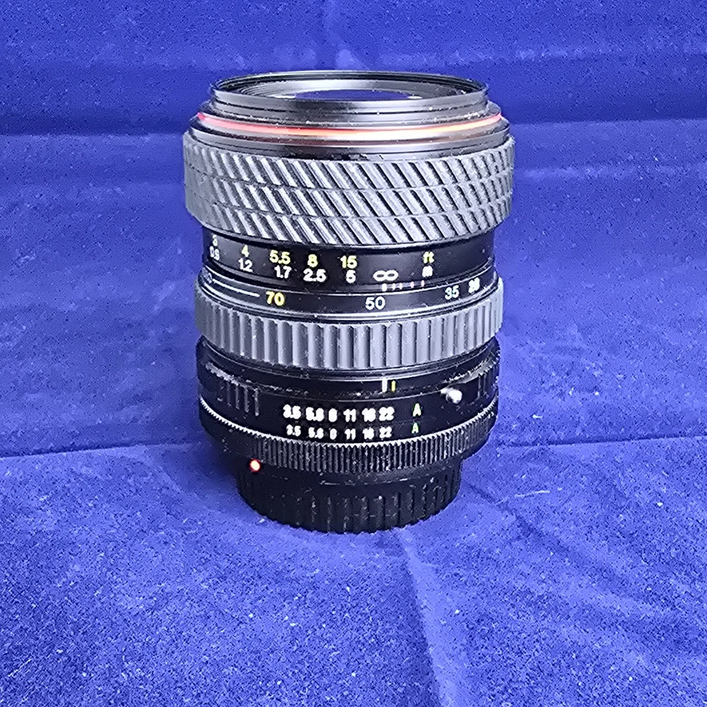 Tokina 28-70 C-FD — Camera Center