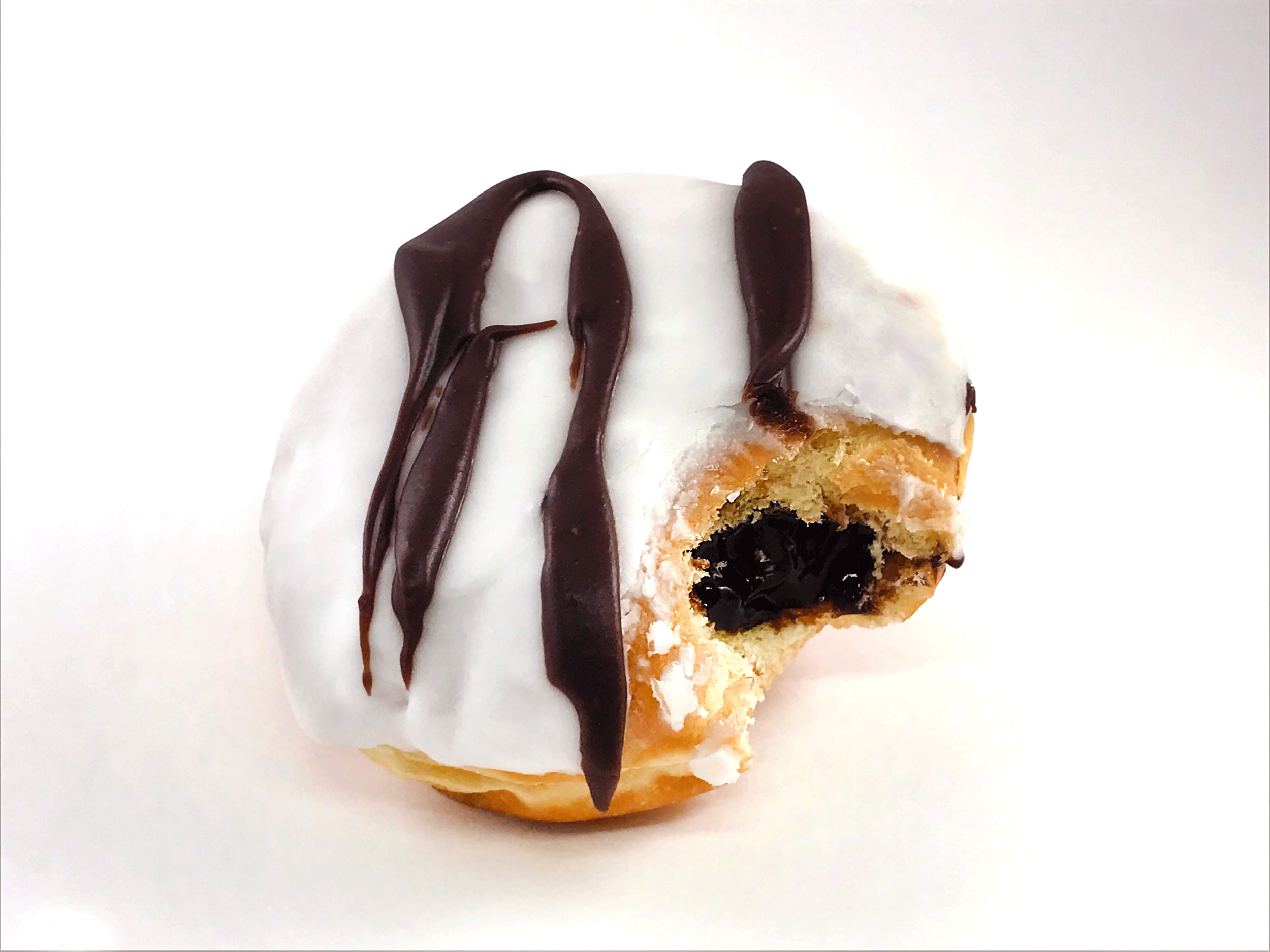 WhiteIcedChocolateFilled-Bite.png