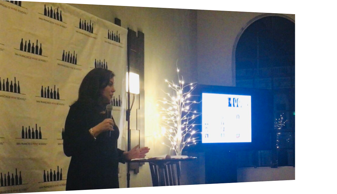 Deborah Farone of Farone Advisors presents at Bubbles, Bites & Bits of Wisdom, Dec. 13, 2018.