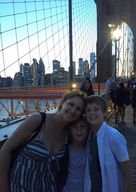 Kim with her kiddos on the Brooklyn Bridge
