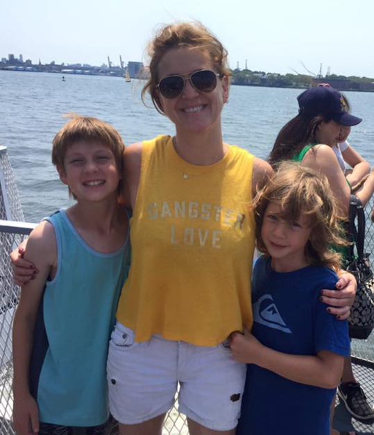 Kim with her kiddos on the ferry.