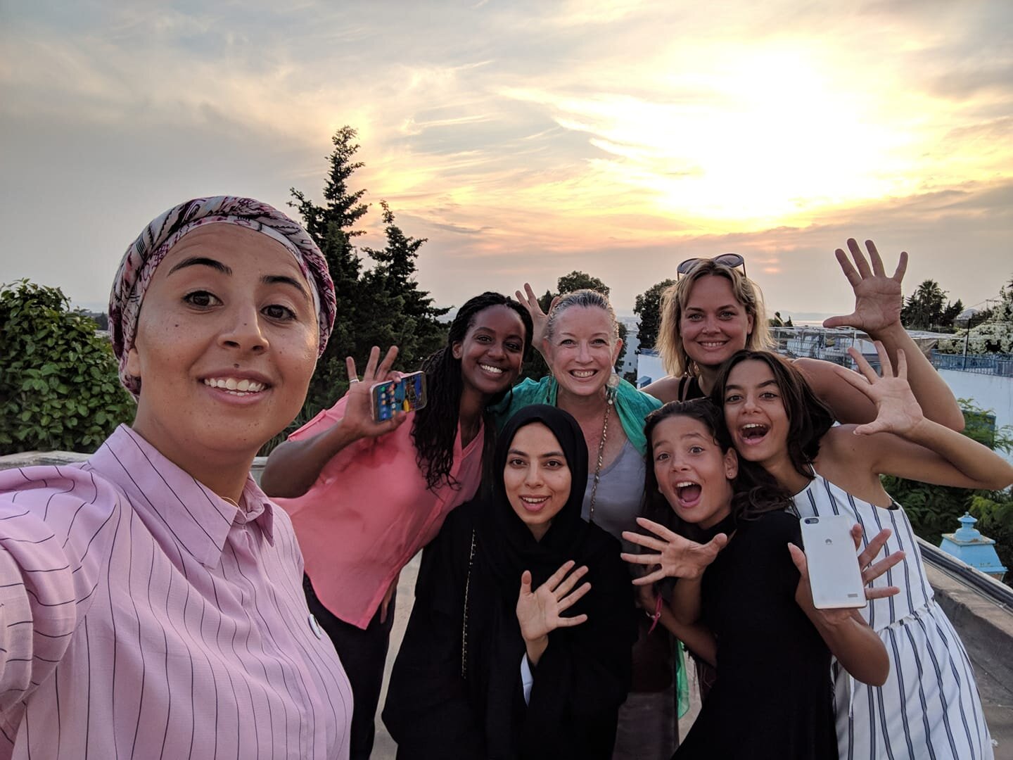 On a rooftop in Sidi Bou Said Tunisia with new friends from three continents - Aug 2018.jpg