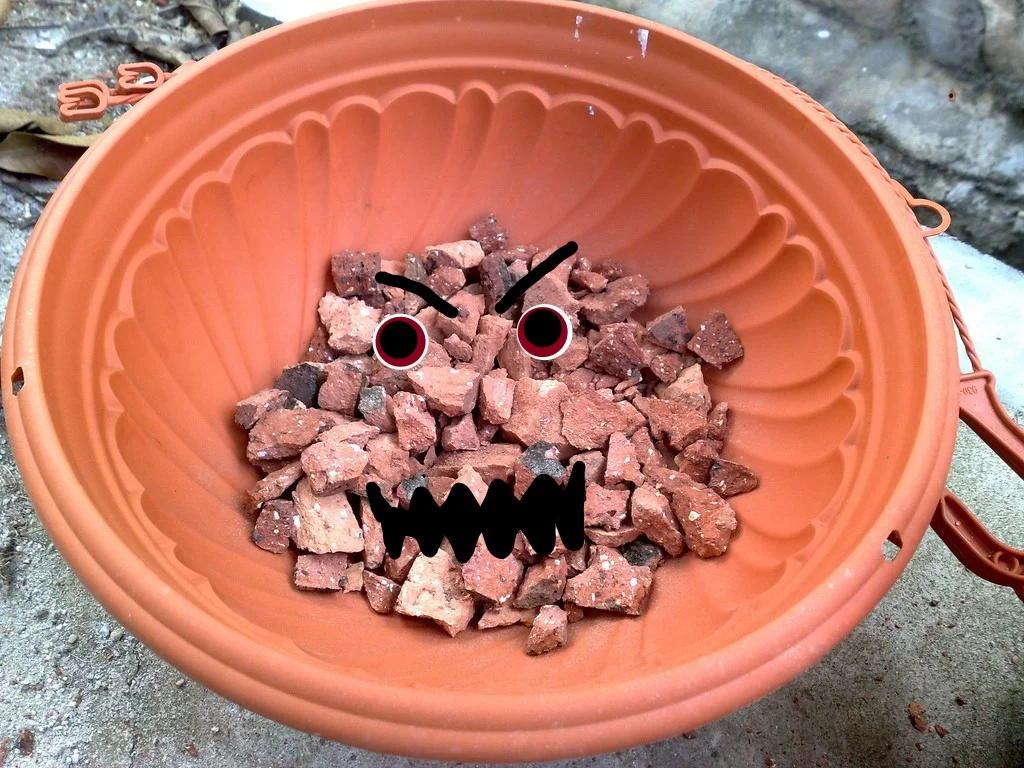 Bricks in Bottom of Pot.jpg