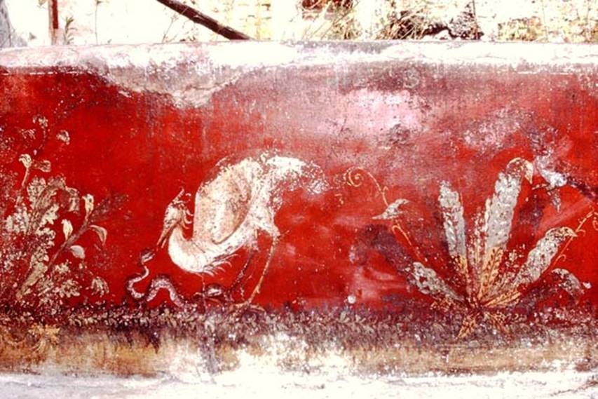 Wall painting of heron, serpent and garden plants