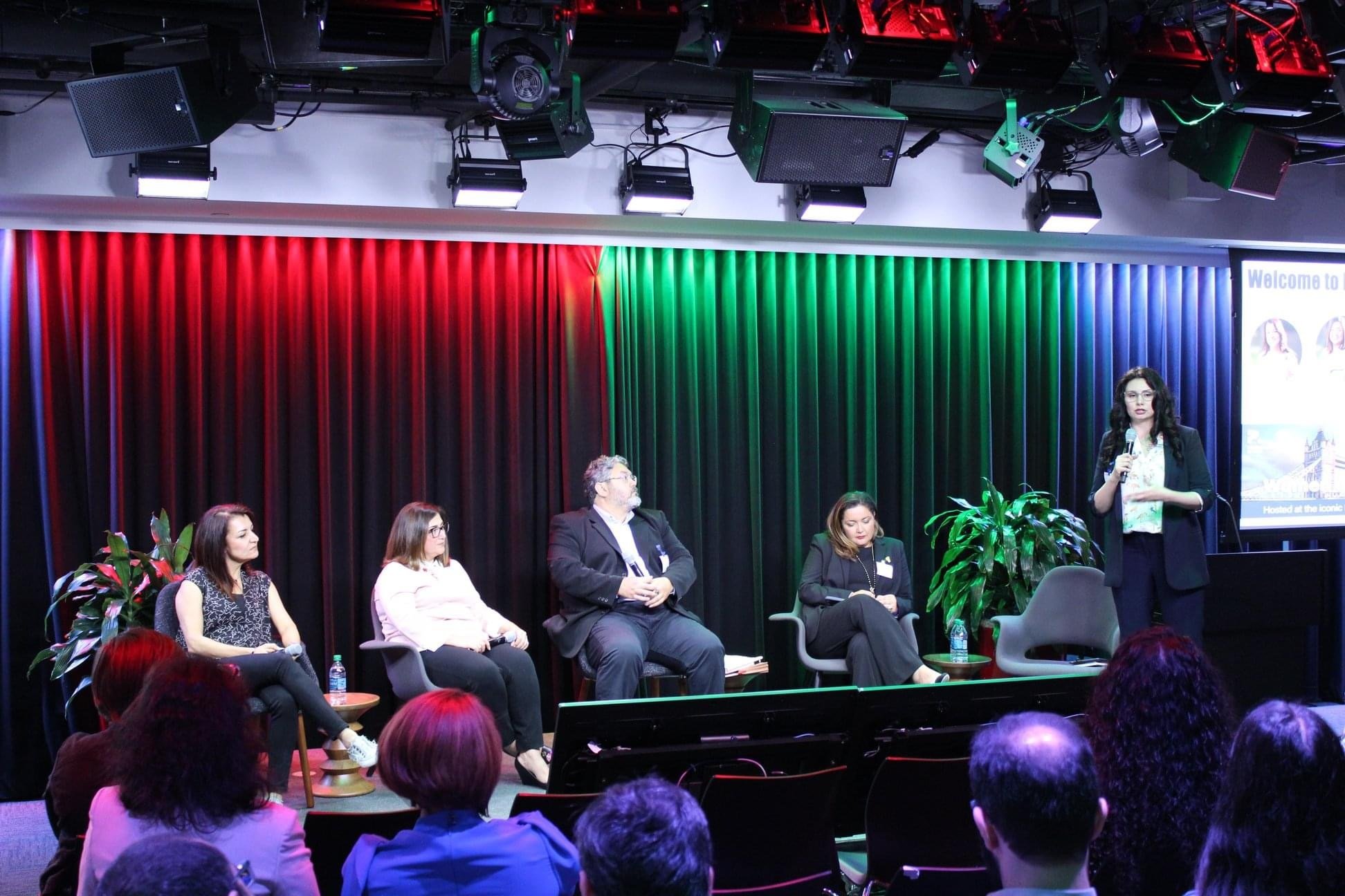 Saleheh Keen speaking on a business and financial education panel