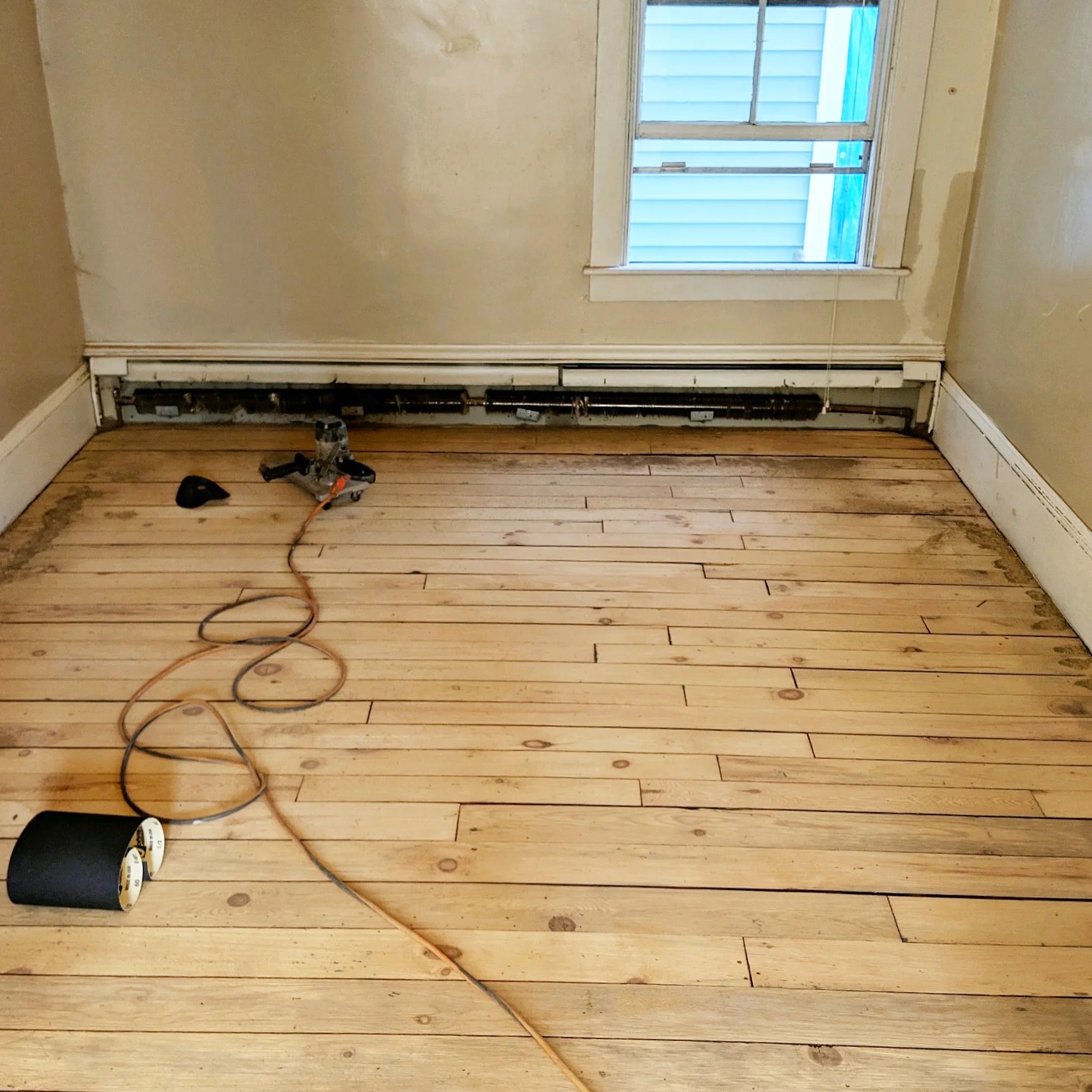 After the room was cleared and the floors sanded…what a difference already!