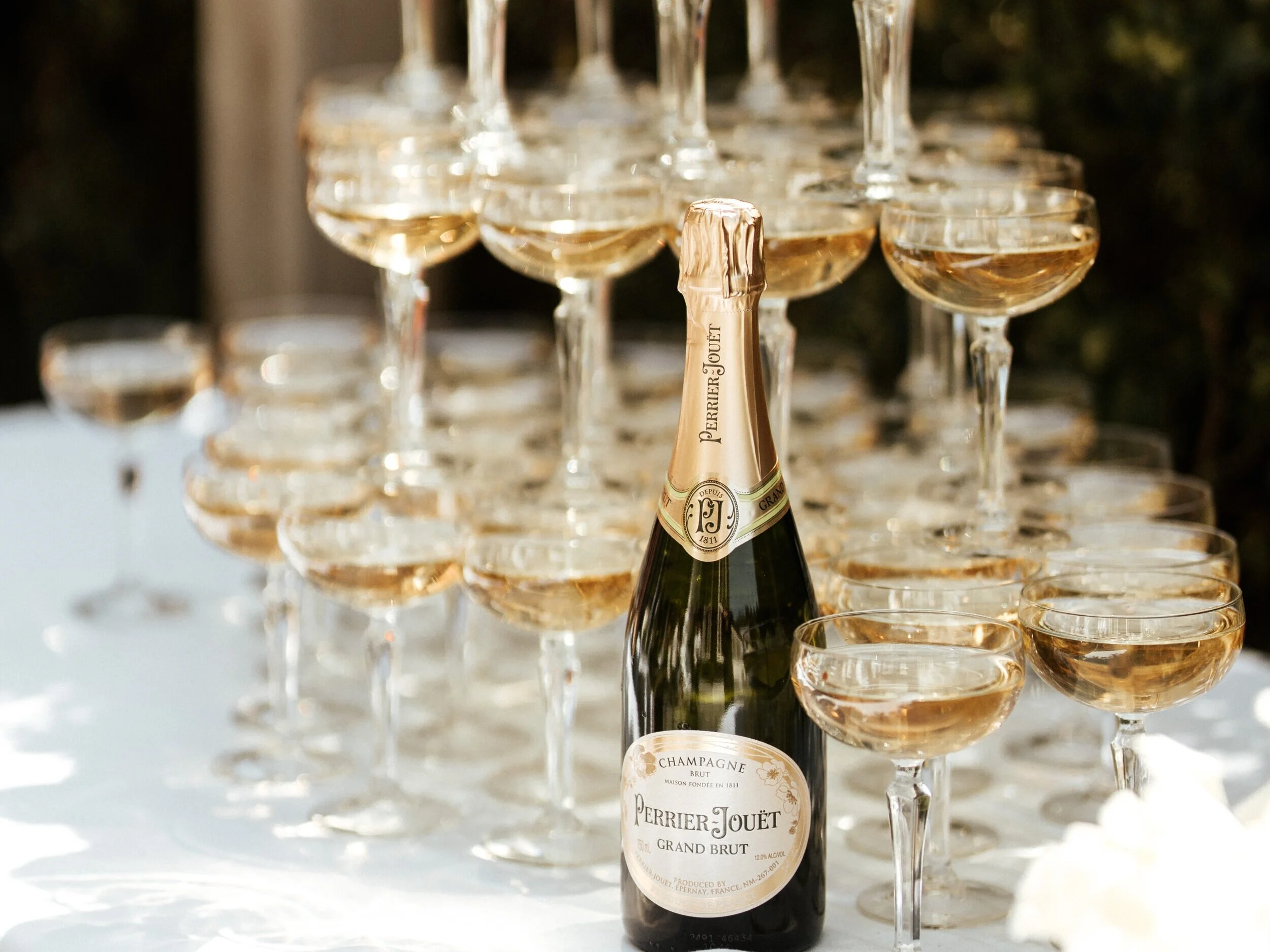 champagne-bottle-coupe-glass-tower.jpg
