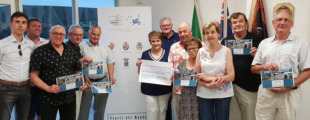 "Federazione delle Associazioni Venete del Victoria (Australia)" includes from the left: Fabio Sandona' (Consultore FAV Victoria), Davide Gottardello (Presidente Padovani nel Mondo - Melbourne), Renzo Zanella (Presidente Veronesi nel Mondo - Melbourne), Giorgio Paccagnan (Presidente Trevisani nel Mondo - Melbourne), Andrea Bettio (Presidente FAV Victoria), Ketti Pezzin (Segretaria FAV Victoria), Luciano Benetti (Tesoriere FAV Victoria), Louis Crema (Presidente Veneto Club - Melbourne), Ida Zanella (Veronesi nel Mondo - Melbourne), Giorgia Rizzato (Presidente Comunita' Montana dei Sette Comuni - Melbourne), Renato Rigon (Vice Presidente Ente Vicentini nel Mondo - Melbourne), Sergio Povolo (Tesoriere Ente Vicentini nel Mondo - Melbourne)
