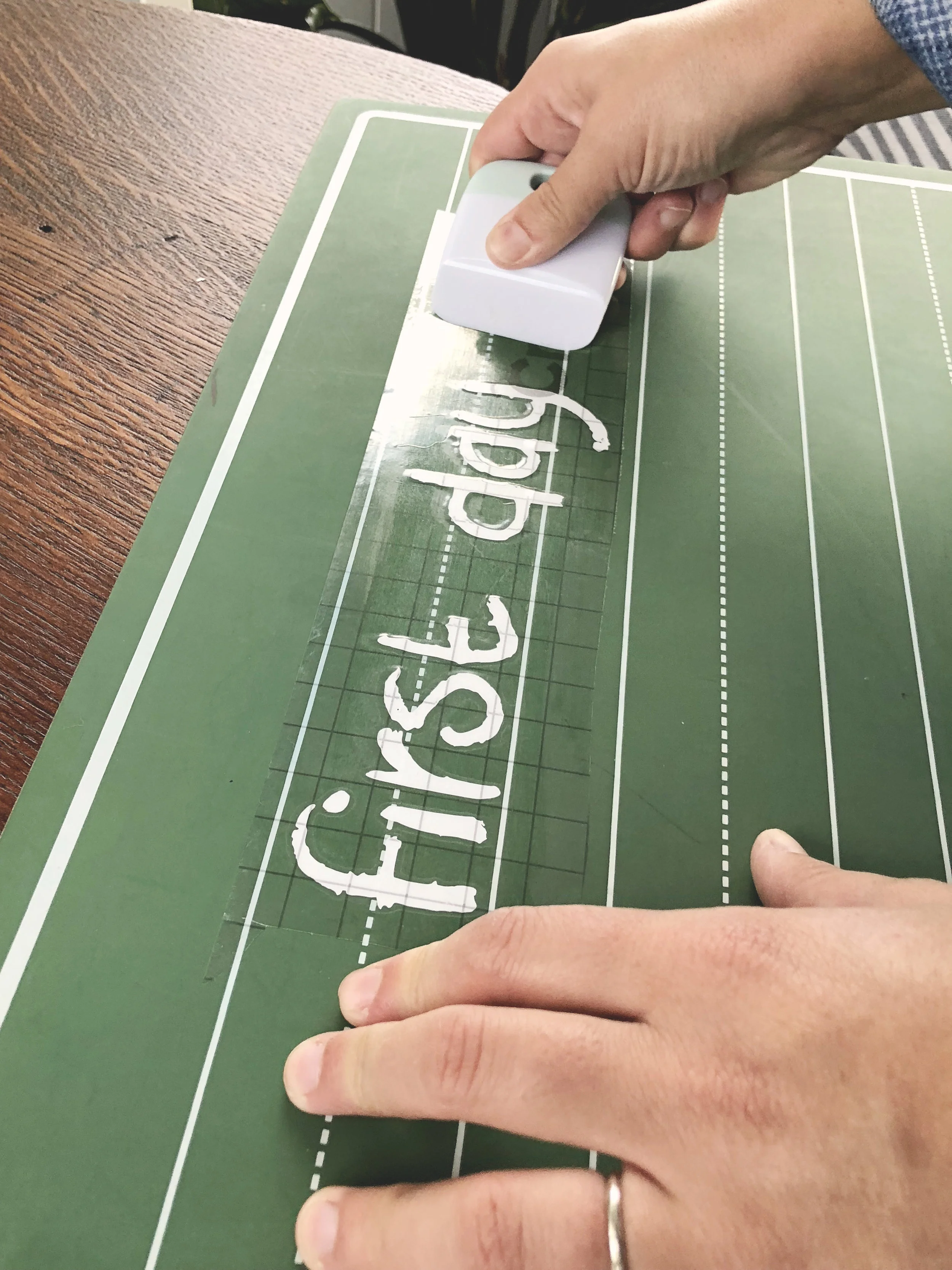 applying the vinyl to the chalkboard