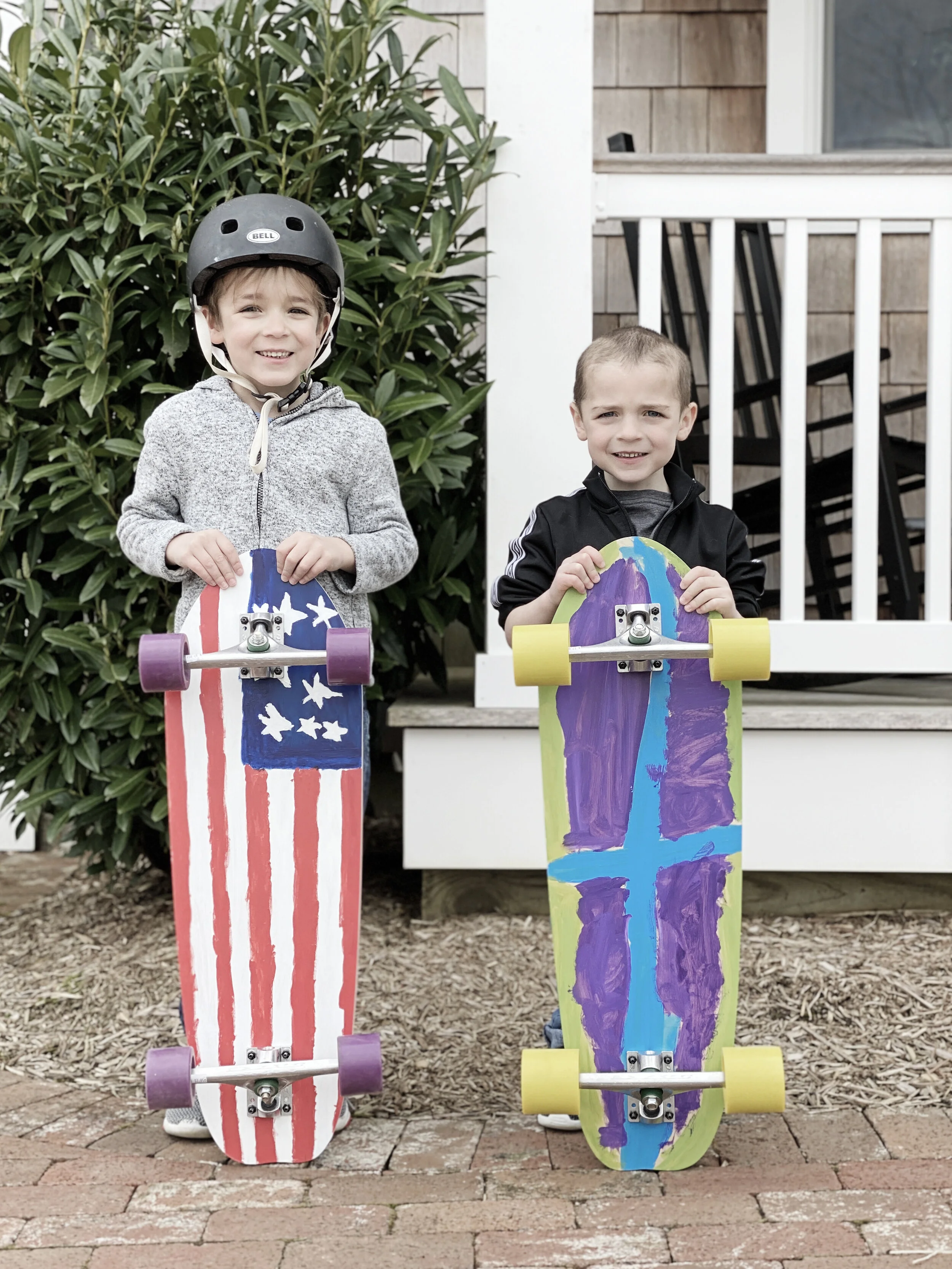 March 16th - Fisher and Jack with their skateboards.JPG