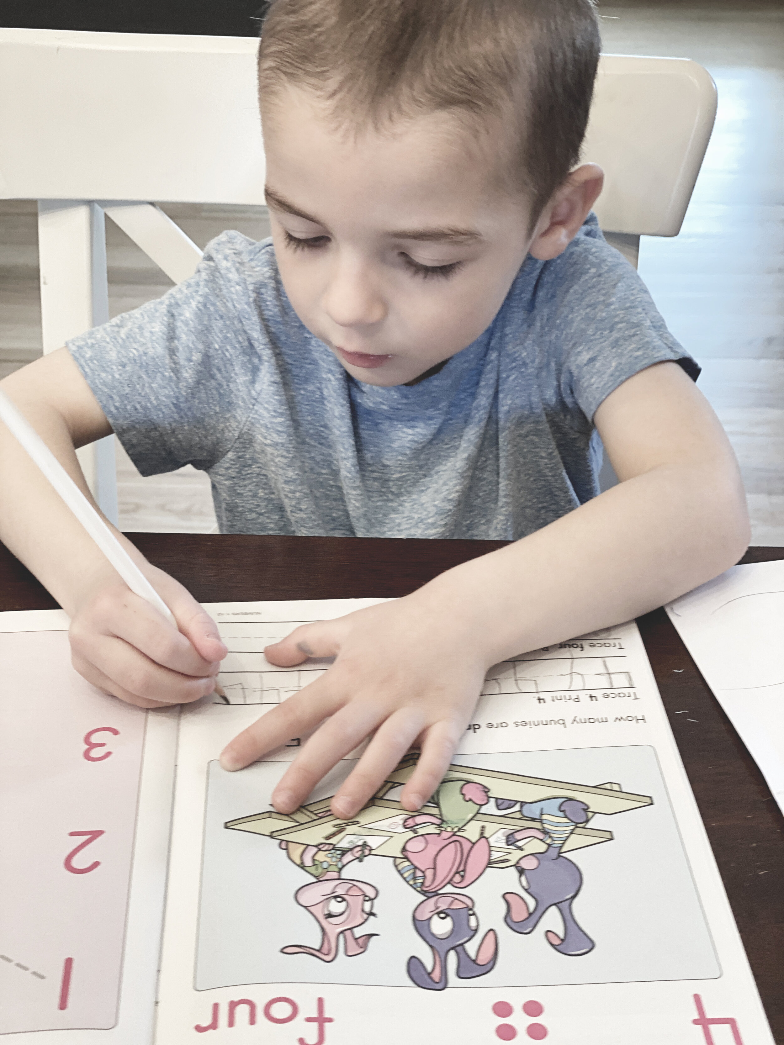 March 17th - Jack doing schoolwork (1).JPG