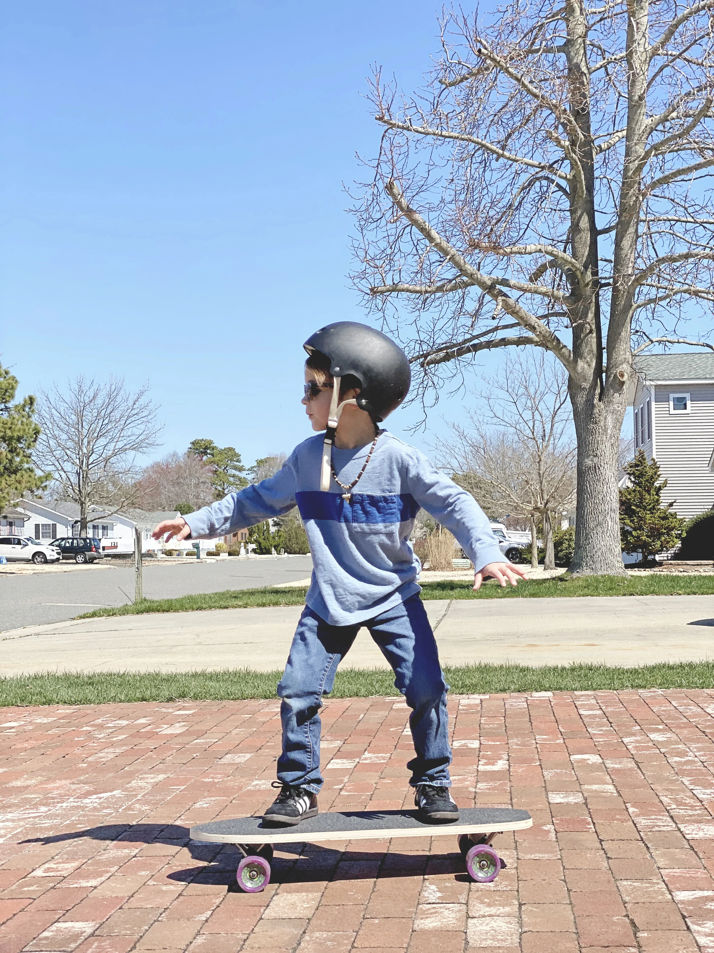 March 26th - Fisher on the skateboard.JPG