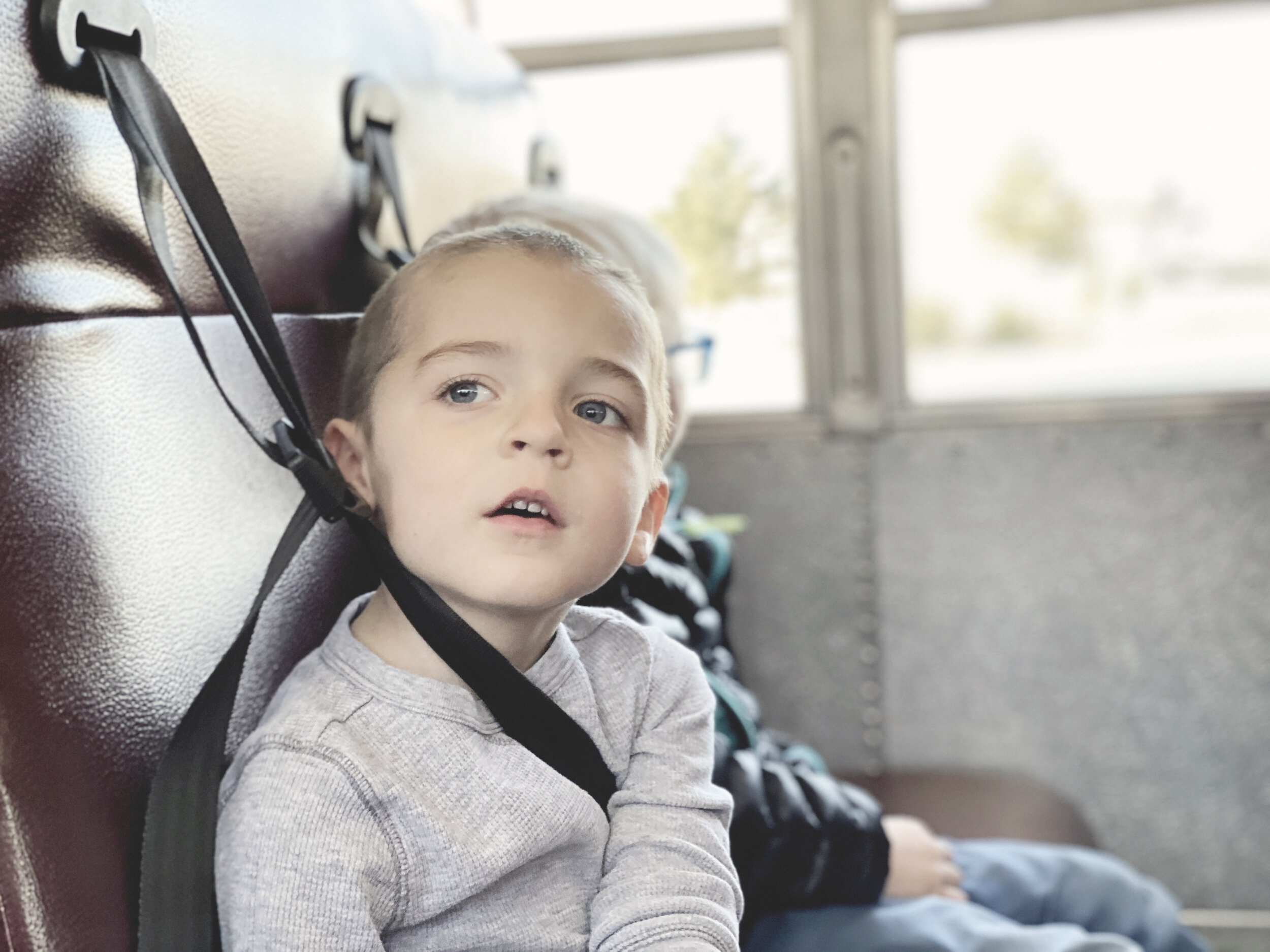 March 11th - Jack on the bus on the way to his field trip (4).JPG