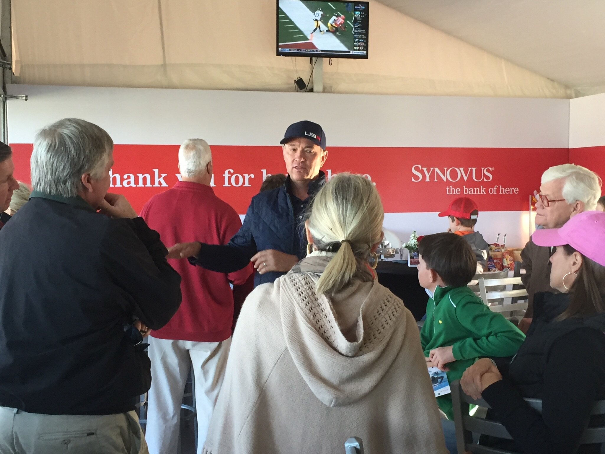 Davis Love III speaks with guests at the Synovus Chalet at the 2016 RSM Classic