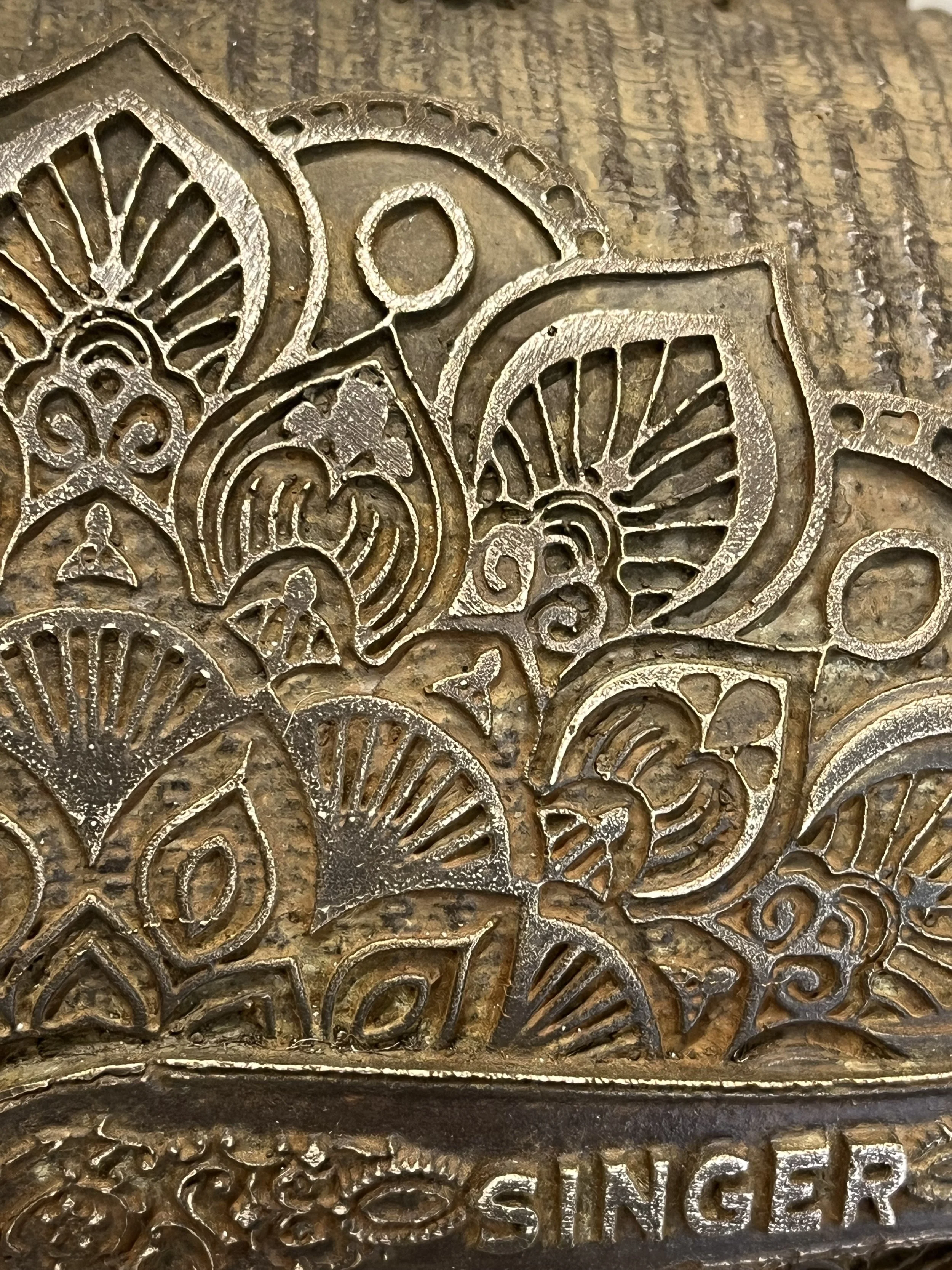 Detail of the Bangladesh River Boat showing Singer sewing machine and Bangladeshi Alpana design