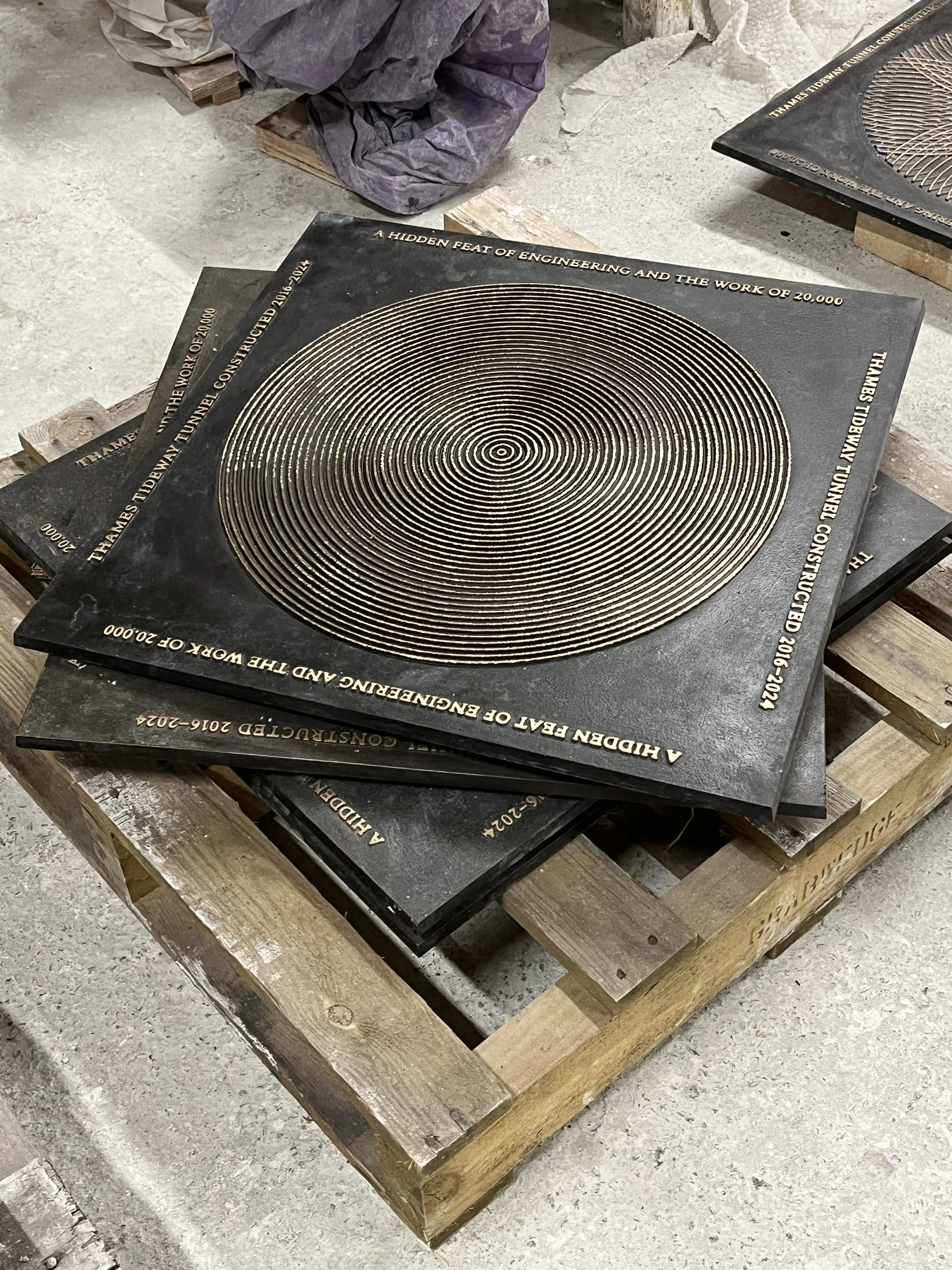 Bronze plaques, by Marina Willer, Pentagram