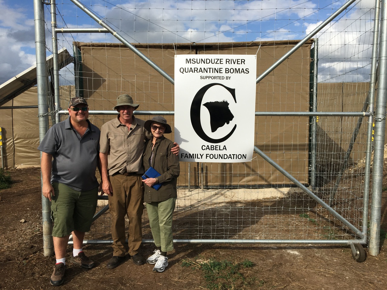 Ivan Carter with Dan and Mary Cabela at the quarantine bomas in South Africa.