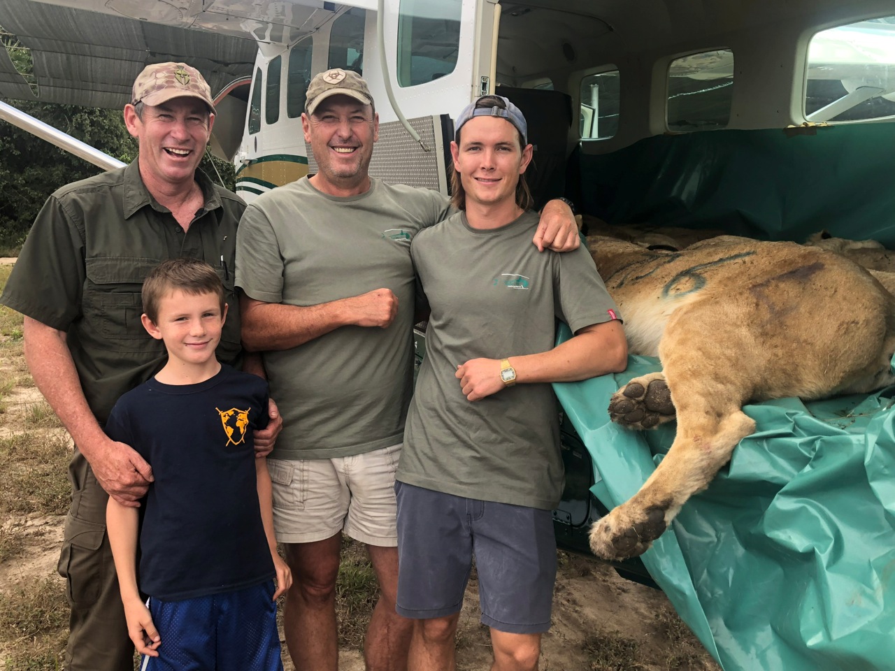 Two generations of conservation, Mark Haldane and his son Dustan and Ivan Carter and his son Trail.