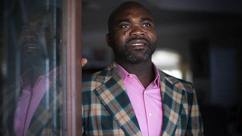 Mambasse Patara, a Marine and LAPD officer, said he had no idea his handyman was an undocumented immigrant when he drove through a Border Patrol checkpoint. He figured it was a simple misunderstanding, but prosecutors spent a year trying to send him to federal prison. (Gina Ferazzi / Los Angeles Times)