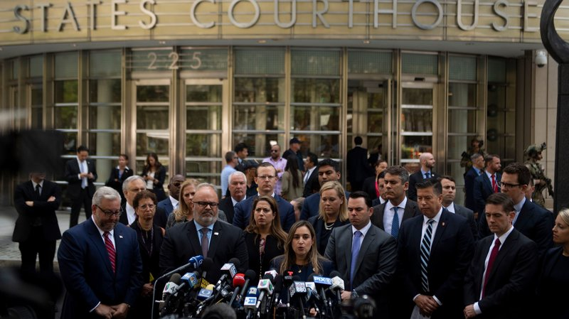 Joaquin Guzmán, also known as "El Chapo," was sentenced Wednesday to a life term in prison plus 30 years. After the sentencing in a Brooklyn courthouse, U.S. attorneys and other officials greeted the media, including Ariana Fajardo Orshan, U.S. attorney for the Southern District of Florida. Johannes Eisele/AFP/Getty Images
