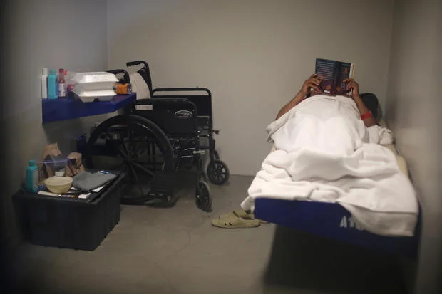An ICE detainee lies in his cell in the segregation wing at the Adelanto immigration detention center, which is run by the Geo Group Inc (GEO.N), in Adelanto, California, U.S., April 13, 2017. REUTERS