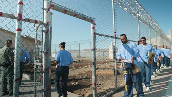 SHIRLEY CHAN/HUFFPOST. Inmates entering the GRIP training room at Avenal State Prison.