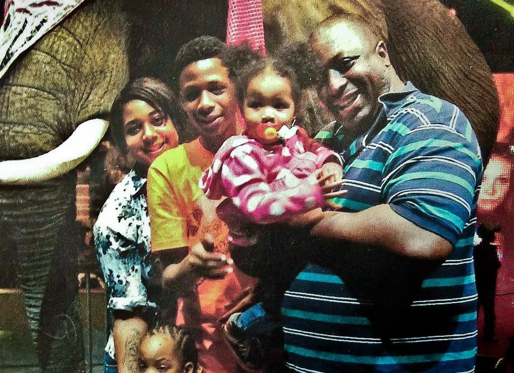 Mr. Garner, in an undated family photo, with his children. Credit via Associated Press