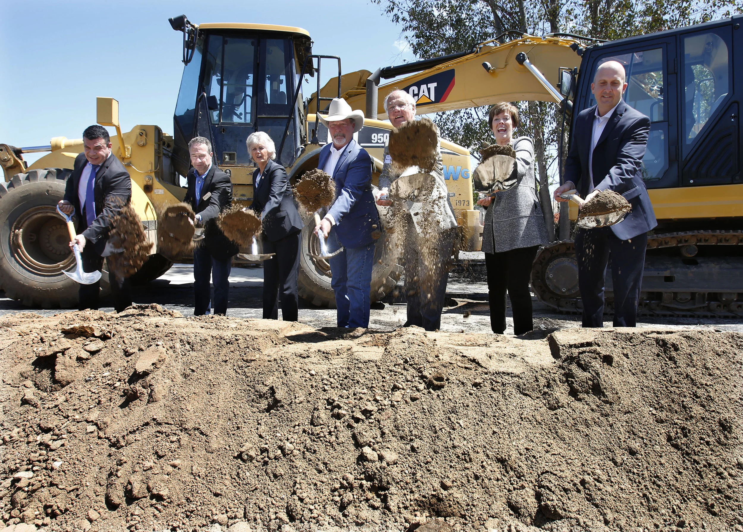 Nick Macchione, Director & Deputy Chief Admin Officer, Health and Human Services Agency; Mark Niles, SVP, CA Community Reinvestment Corp; Supervisor Dianne Jacob, County of San Diego, District 2; Steve Vaus, Mayor, City of Poway; Ted Merchant, Chairman of the Board, Villa de Vida, Inc.; Lori Saito, VP, Wells Fargo Bank ; Ed Holder, VP, Mercy Housing CA, shoveling in the ceremonial dirt.