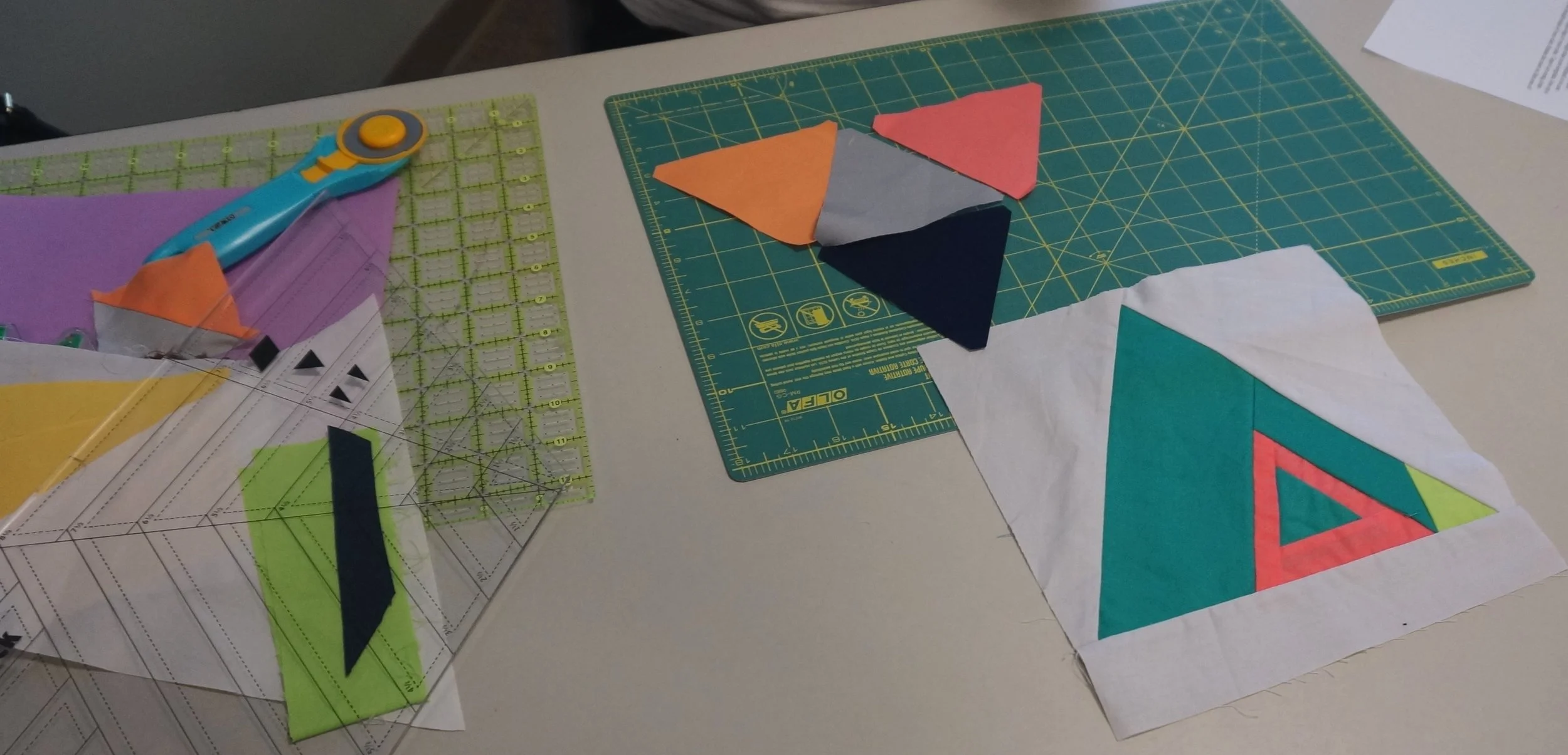 Piece together smaller triangles or make a log cabin triangle.