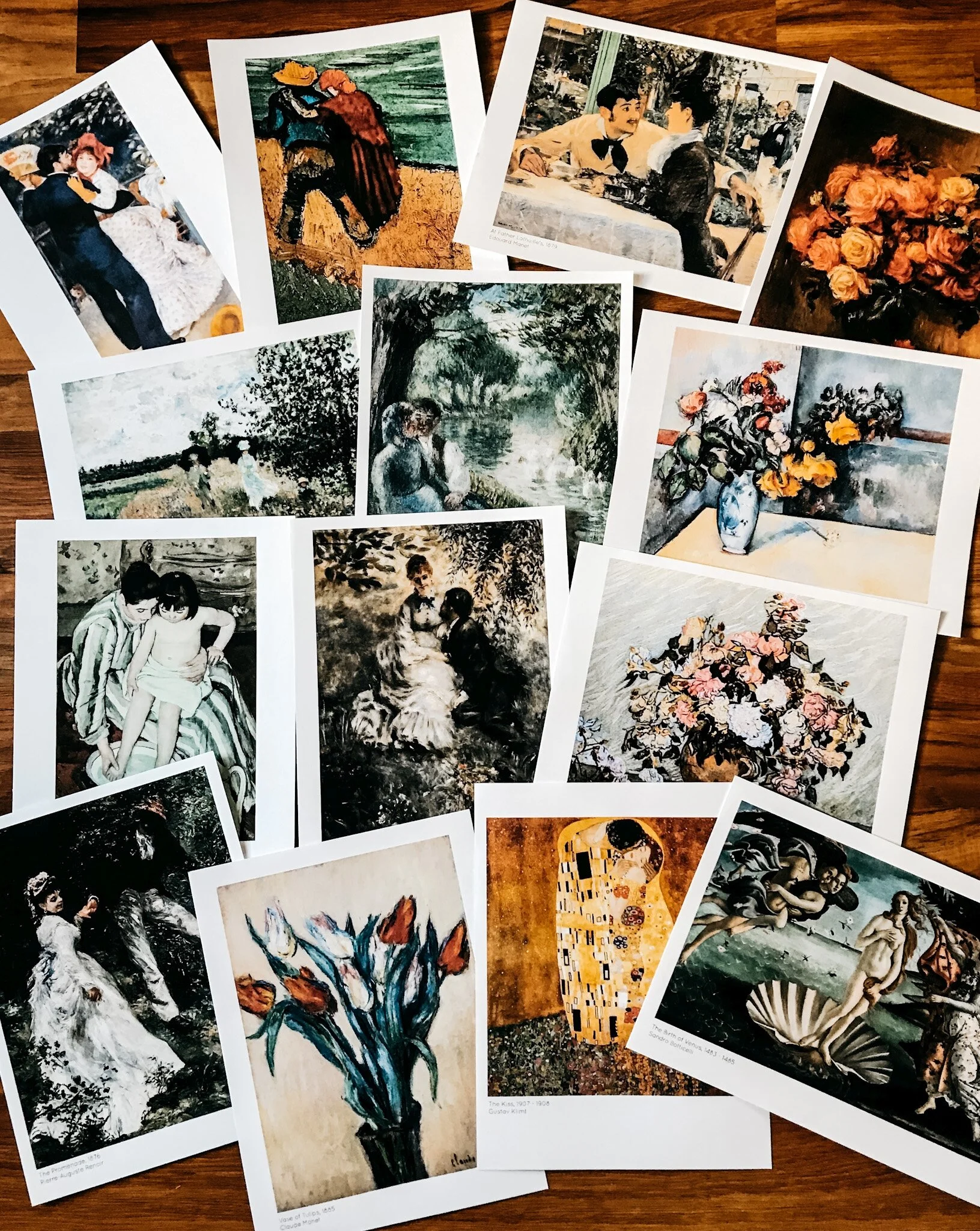 Printed Valentine’s Day pages displayed as wall art, featuring public domain paintings.