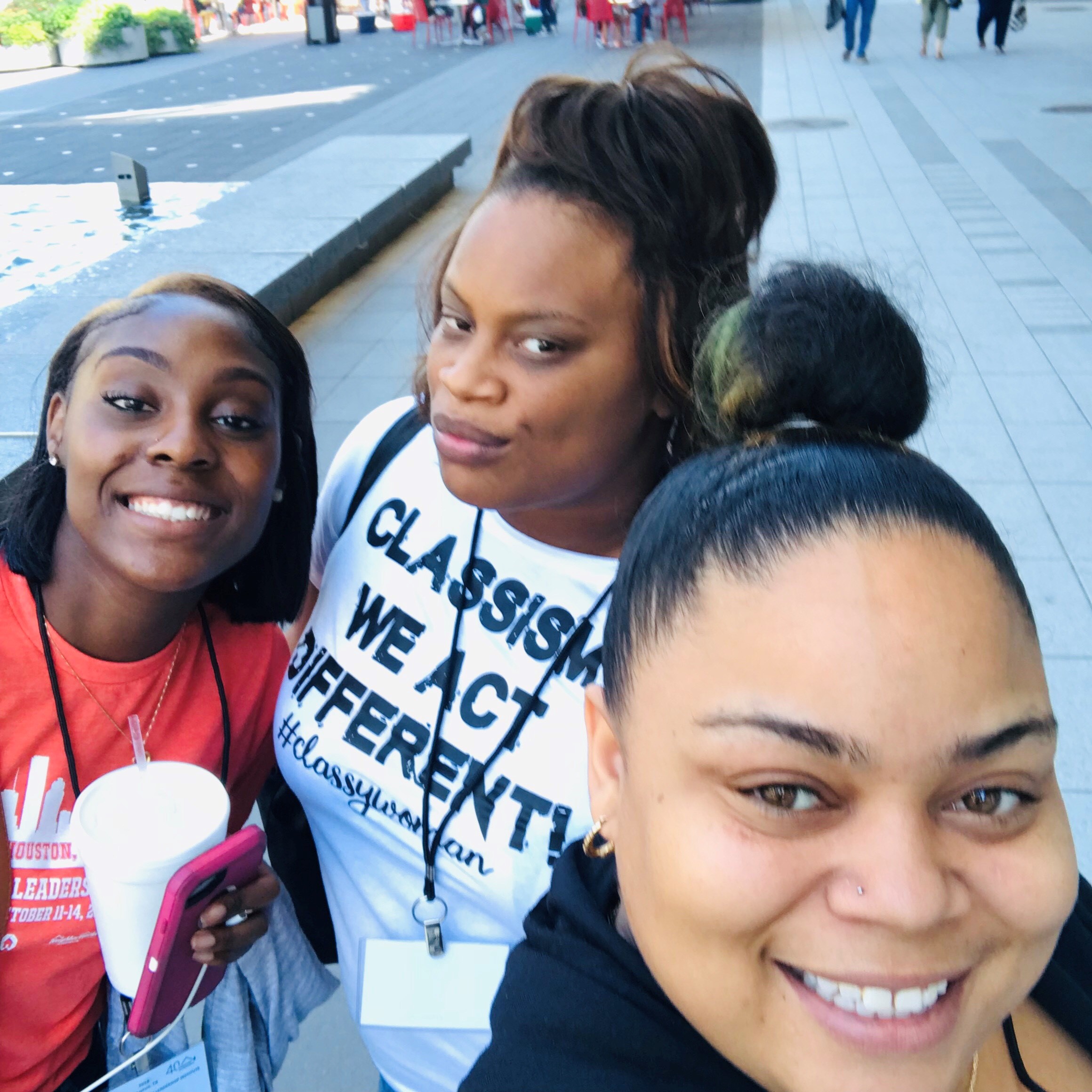 Homeport residents, left to right, Lakeisha Terry, Deja Lindsey and LaToya Penick, outside the convention hotel in Houston where community leadership courses were offered.