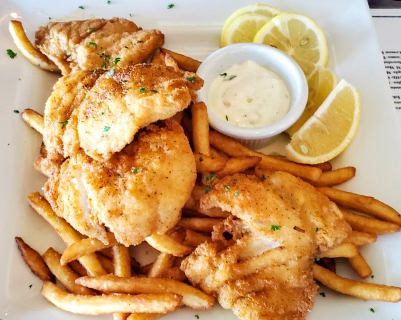 Our Fish and Chips dish is ready for its close-up 📸 😋

Bite into best catch white fish lightly breaded and served with lemon, tartar sauce, and shoestring french fries 😋