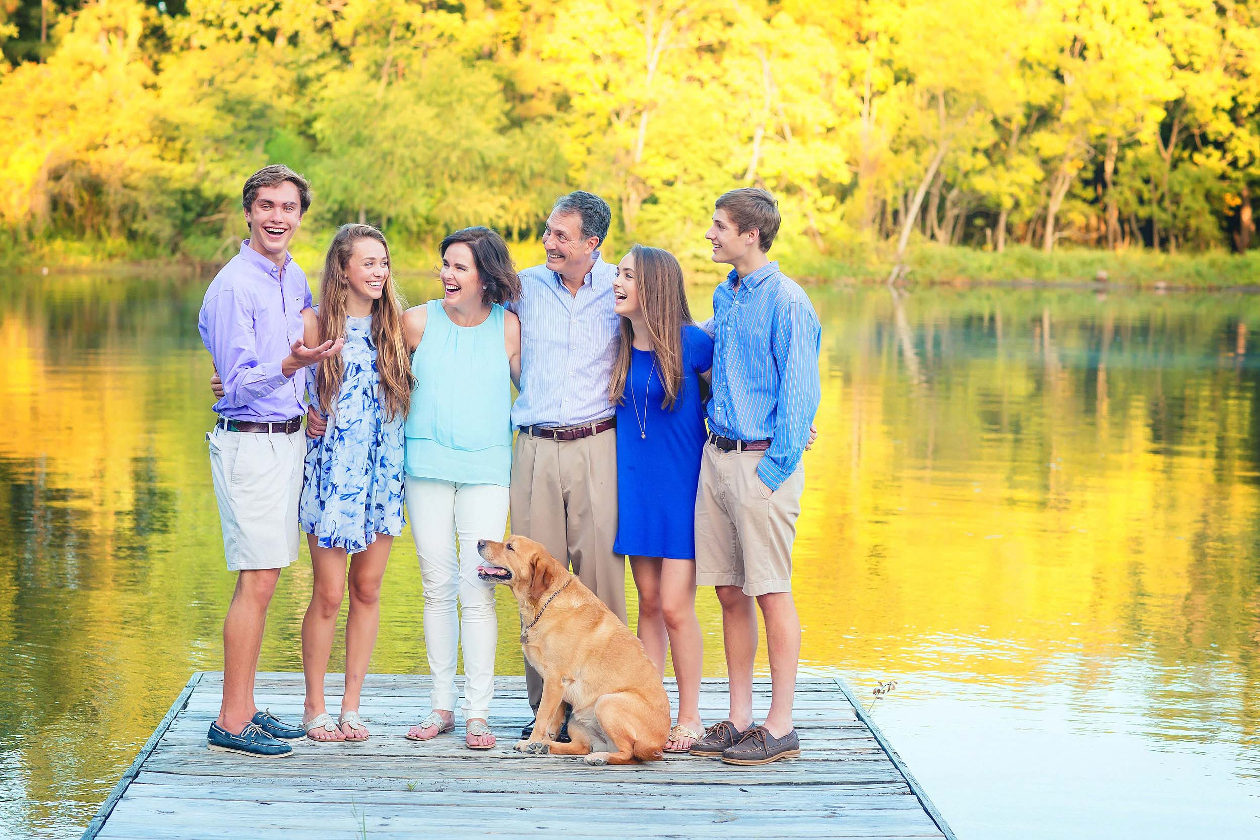  Fun family portrait with teenagers and dog in The Woodlands, Texas by spryART photography. 