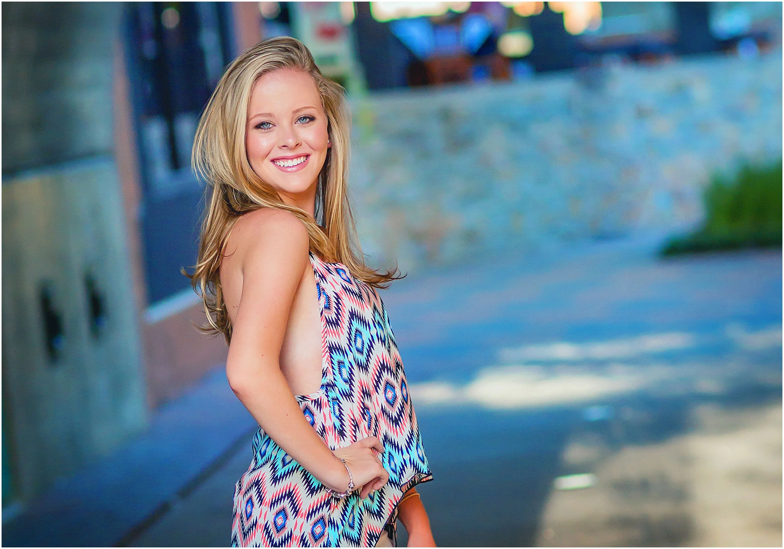 Photograph of senior girl on the waterway in the Woodlands Texas by Senior Photographer spryART photography.