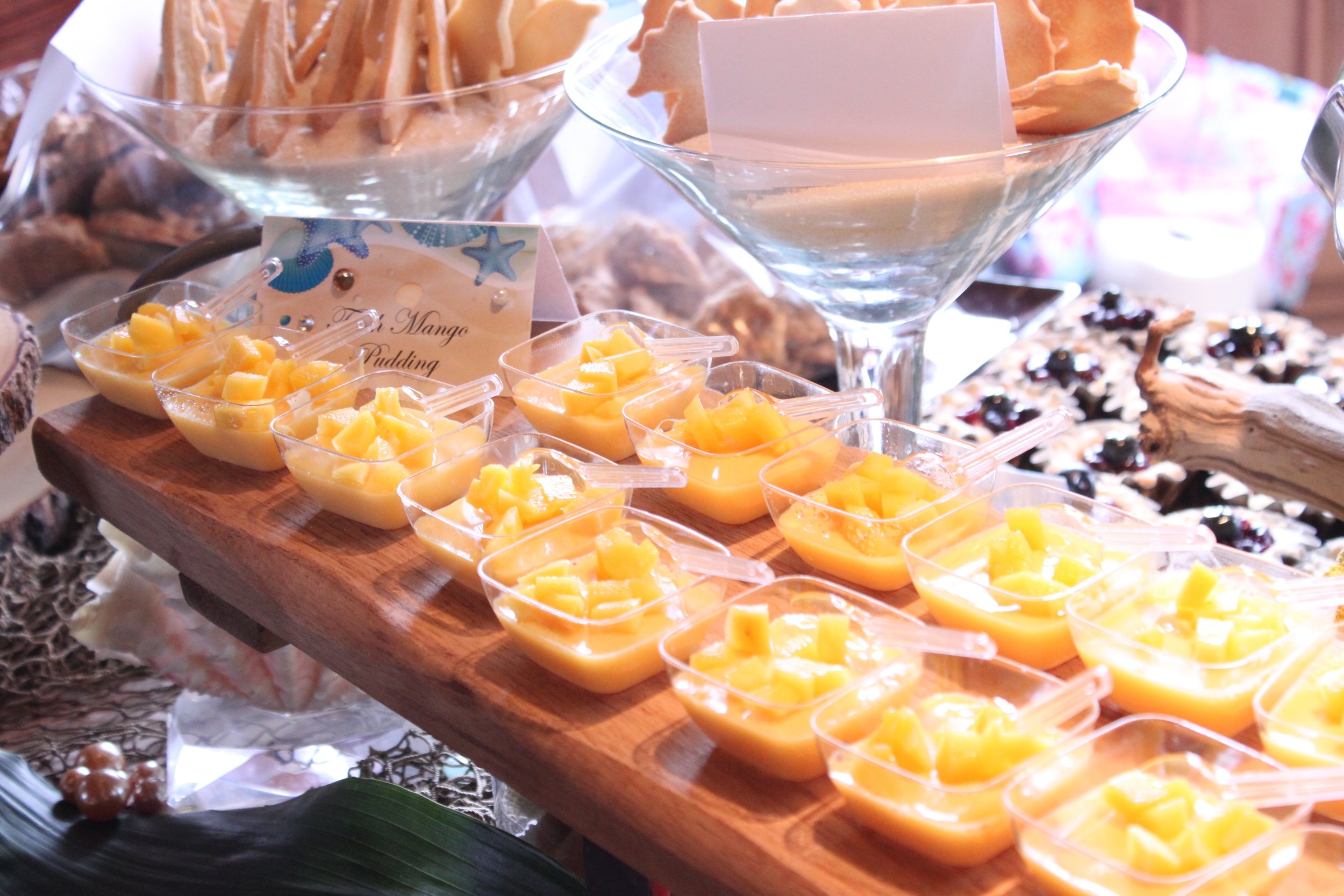 Mango Pudding dishes are displayed on a table. 
